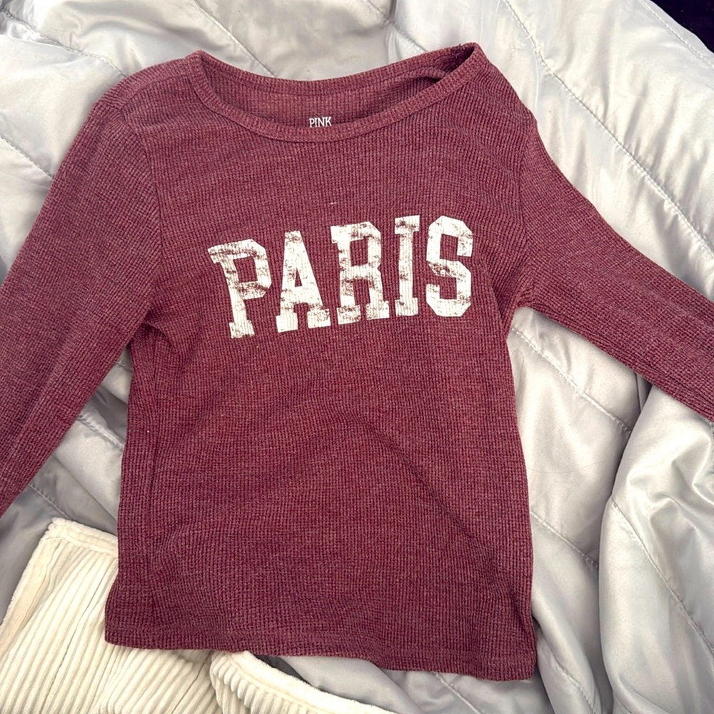 This shirt is from pink republic, a size small. It looks cropped but is not.